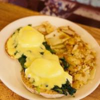 Popeye Benedict · 2 poached eggs and sauteed spinach over English muffin, topped with hollandaise sauce.