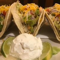 Bbq chicken tacos (3) · Lettuce, tomato,red onion, avocado, cheddar & monterey cheeses served w/ sour cream and fres...