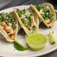 chicken plancha tacos (3) · marinated grilled chicken on corn tortillas served with verde tomatillo sauce