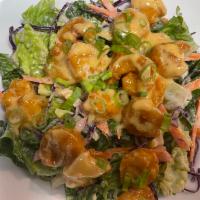 Firecracker Shrimp Salad · fried shrimp tossed in home made bang bang sauce on top of salas with romain lettuce, red ca...