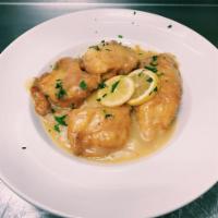 Chicken Francaise · Served with lemon wine sauce, served over rice and choice of vegetable.
