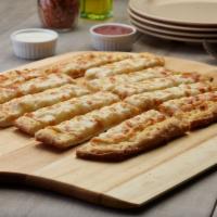 Cheesy Bacon Bread · These breadsticks have our signature garlic spread, fresh diced mozzarella cheese and crunch...