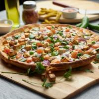 Tandoori Veggie Pizza Twist · This pizza has our signature tandoori sauce, fresh diced mozzarella cheese, fresh mushroom, ...
