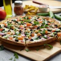 Indian Veggie Pizza Twist · This pizza has our signature creamy garlic sauce, fresh mushroom, fresh green pepper, juicy ...