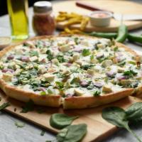 Palak Panner Pizza Twist · This pizza has our signature pesto sauce, masala paneer, fresh diced mozzarella cheese, fres...