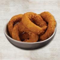 Giant Onion Rings · Served with BBQ Ranch.
