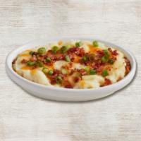 Loaded Mashed Potatoes · Creamy mashed potatoes blended with cheddar cheese, sour cream and real butter. Topped with ...