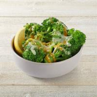 Lemon-butter Broccoli & Cheese · Fresh steamed broccoli with Parmesan butter and lemon topped with mixed cheeses.