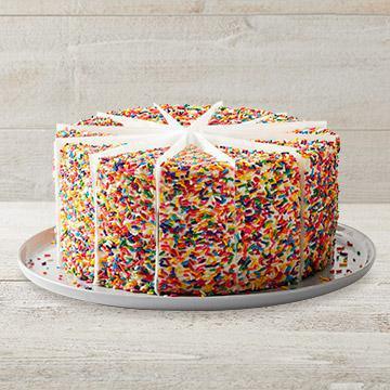 Carlo's Bakery Rainbow Cake - Whole Cake · Take the whole cake home! Six layers of rainbow-colored cake filled high with a sweet vanilla icing and covered with rainbow sprinkles. *12 slices per cake.