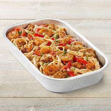 Cajun Shrimp & Chicken Pasta Party Tray · Sauteed shrimp, chicken, red bell peppers, spicy Cajun Alfredo sauce, Parmesan-Romano and fettuccine.