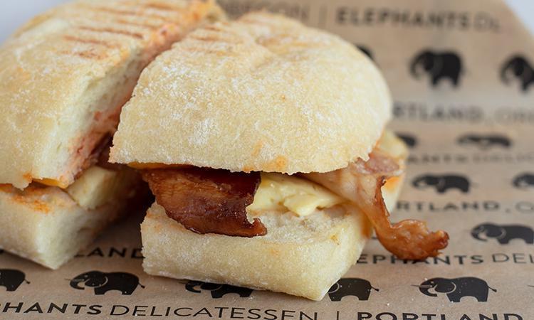 Bacon Breakfast Sandwich · Eggs, bacon, cheddar, and Cholula sauce on ciabatta roll