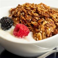 Granola Yogurt Parfait · (vegetarian, wheat-free) House-made granola, vanilla and strawberry yogurt, and fresh season...