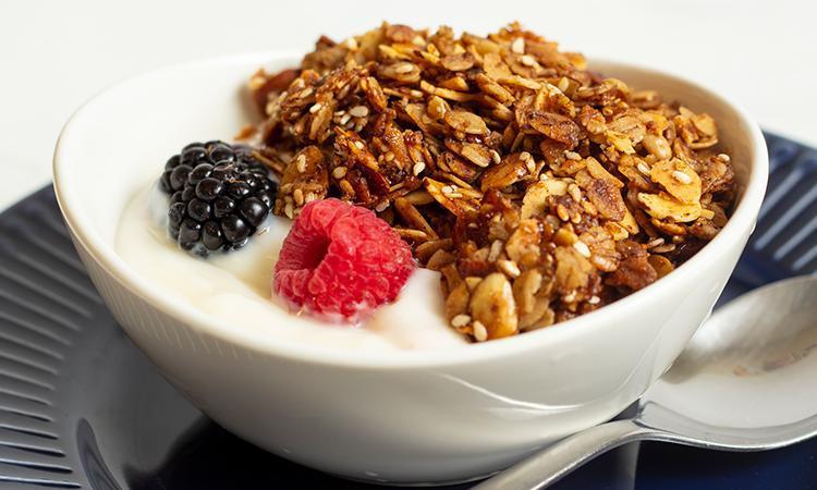 Granola Yogurt Parfait · (vegetarian, wheat-free) House-made granola, vanilla and strawberry yogurt, and fresh seasonal berries