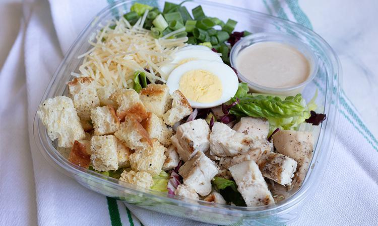 Chicken Caesar Salad · Romaine, chicken breast, hard-boiled egg, radicchio, croutons, and Parmesan with our Caesar dressing. Please no substitutions or modifications.