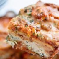 Lasagna Marinara Slice · (vegetarian) Layers of lasagna with ricotta filling, spinach, and our béchamel sauce