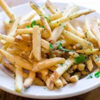Garlic French Fries · French fries tossed in butter, garlic, parsley, and olive oil