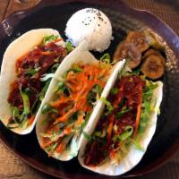 Taco Plate · 3 tacos of your choice with 2 sides.