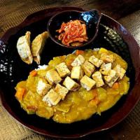 Organic Tofu Curry · Fried tofu and steamed rice.
