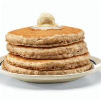 Harvest Grain ’N Nut® Pancakes · Go nuts for four fluffy pancakes filled with wholesome oats, almonds & walnuts and topped wi...