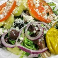 Mediterranean Salad · Lettuce, onion, tomato, cucumbers, feta cheese, olives, olive oil and vinegar .