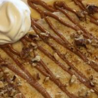 Celestino Crepe · Dulce de leche and walnuts. Topped with caramelized sugar.