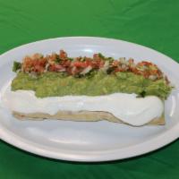 Super Quesadilla No Meat · Big flour tortilla with melted cheese topped with sour cream, guacamole and pico de gallo sa...