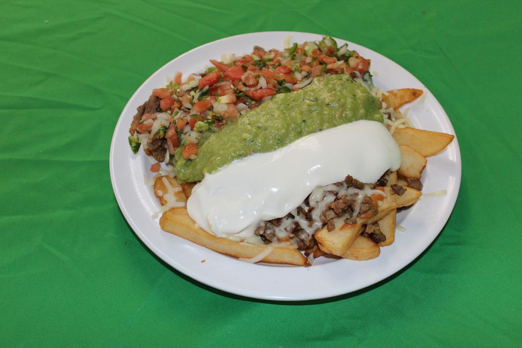 Nacho Fries · French fries topped with re-fried beans, cheese, choice of meat, sour cream, guacamole and pico de gallo salsa.