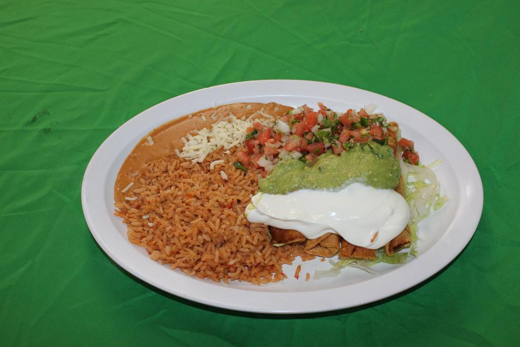Flautas Dinner Plate · 4 fried rolled corn tortillas with chicken, re-fried beans, rice, topped with guacamole, sour cream, lettuce and pico de gallo salsa.