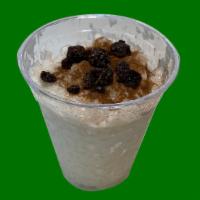 Rice Pudding · Rice pudding topped with cinnamon.