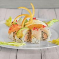 Rainbow Roll · Assorted raw fish and roe on top, shredded imitation crab inside.