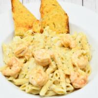 Pasta Alfredo With Shrimp · Shrimp with penne pasta in alfredo sauce. Served with garlic bread.