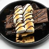 Camp Fire S'mores · Slice of warm chocolate cake between two graham crackers topped with Hershey's chocolate bar...