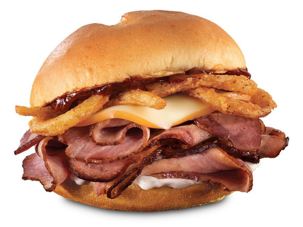 Smokehouse Brisket Sandwich · Sliced smoked brisket with melted Gouda cheese, crispy onions, smoky BBQ sauce and mayonnaise on a toasted specialty roll. Visit arbys.com for nutritional and allergen information.