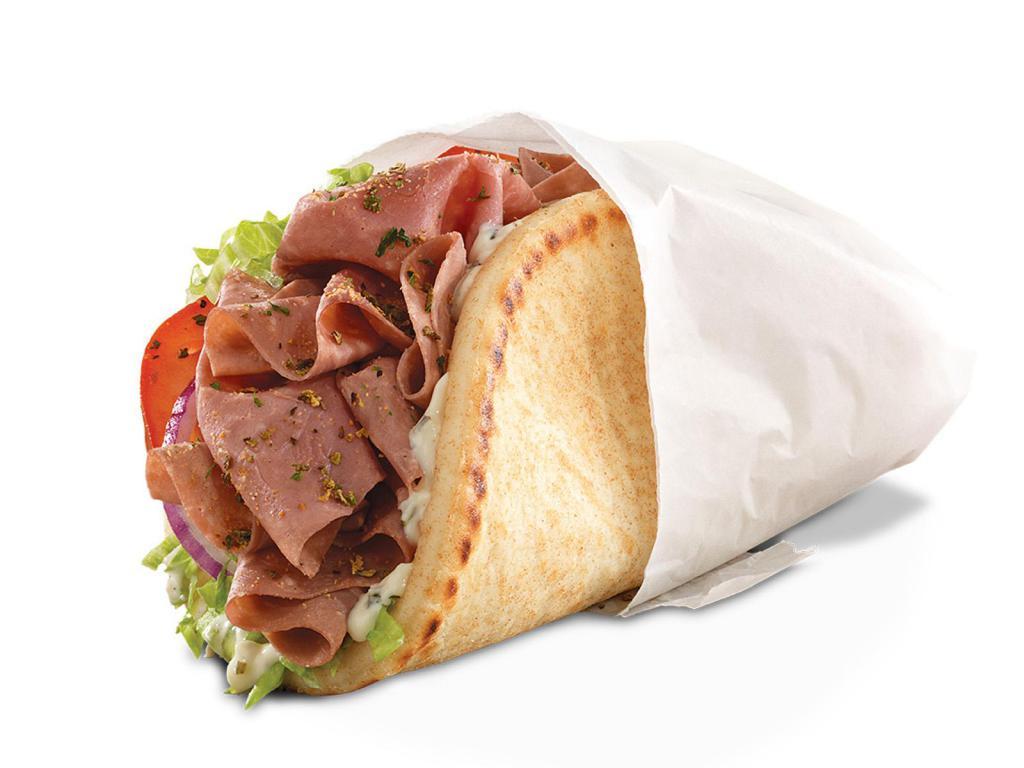 Roast Beef Gyro · Thinly sliced seasoned roast beef with Greek Seasonings, cool creamy tzatziki sauce, shredded lettuce, tomato and red onion in a warm pita. Visit arbys.com for nutritional and allergen information.
