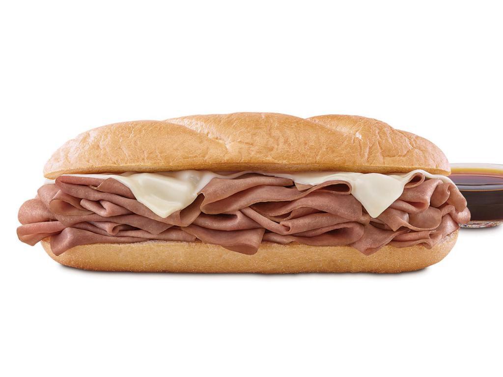 French Dip & Swiss 1/2 lb. with Au Jus Meal · A half pound of thinly sliced roast beef with melted Swiss cheese on a toasted sub roll. Served with au jus for dipping. Meal includes choice of side and drink. Visit arbys.com for nutritional and allergen information.