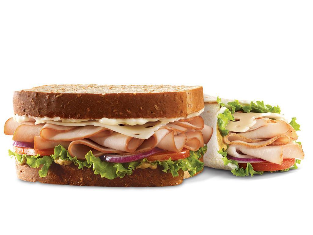 Market Fresh® Roast Turkey & Swiss Wrap · Sliced roast turkey with Swiss cheese, lettuce, tomato, red onion, spicy brown honey mustard and mayo in a hearty grain wrap. Visit arbys.com for nutritional and allergen information.