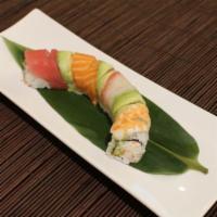 Rainbow Roll · California roll topped with tuna, salmon, white fish, shrimp, and avo.