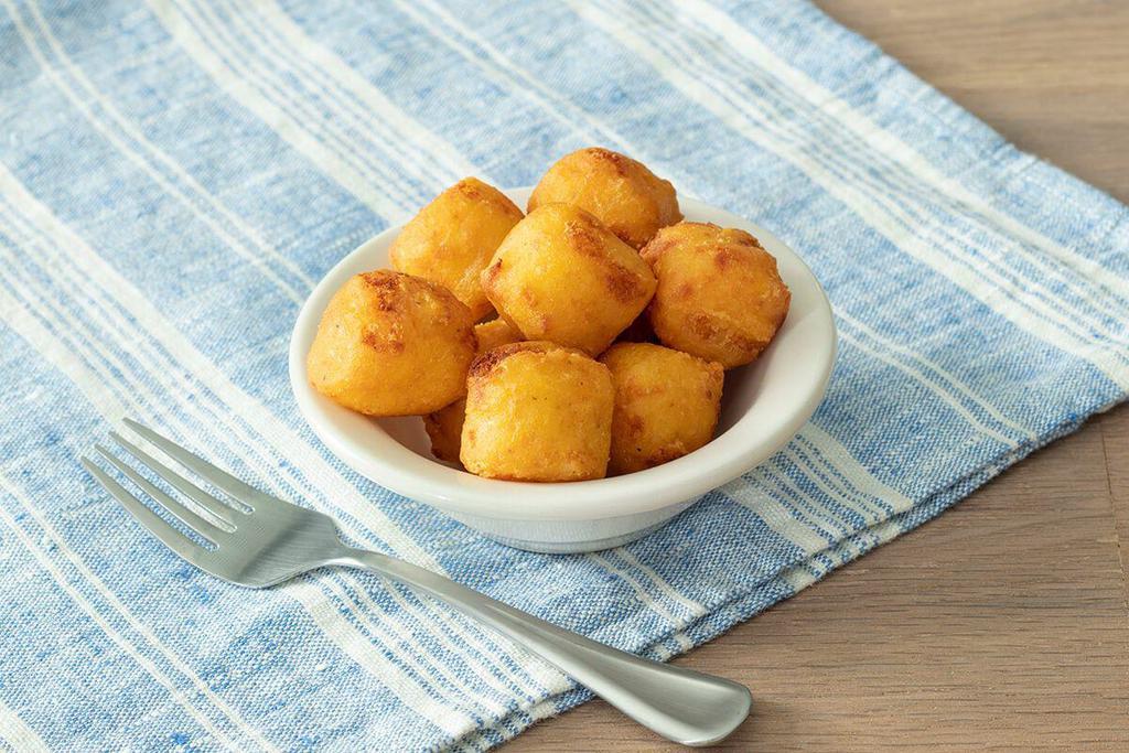 Hashbrown Casserole Tots · Our Hashbrown Casserole fried into crispy bite-sized tater tots.