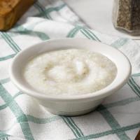 Coarse Ground Grits · Course Ground Grits slow cooked with margarine and salt.

