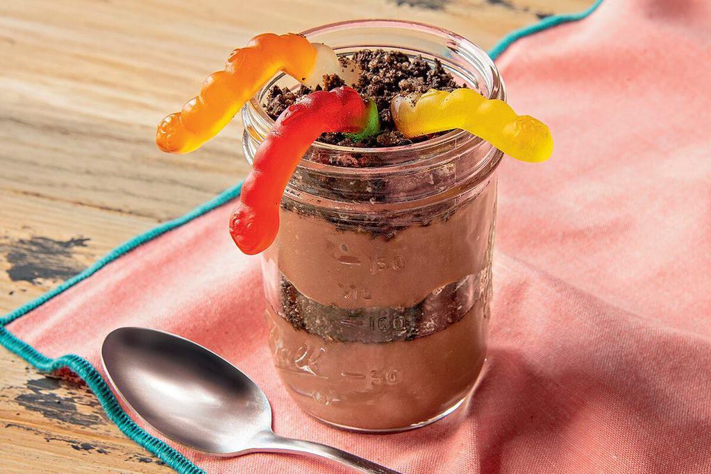 Dirt Cup Dessert · Permission to play with dirt! Layers of chocolate pudding, chocolate cookie crumbles, and gummy worms.