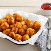 Hashbrown Casserole Tots · Serves 5 | Our hashbrown casserole is fried into crispy bite-sized tater tots.



