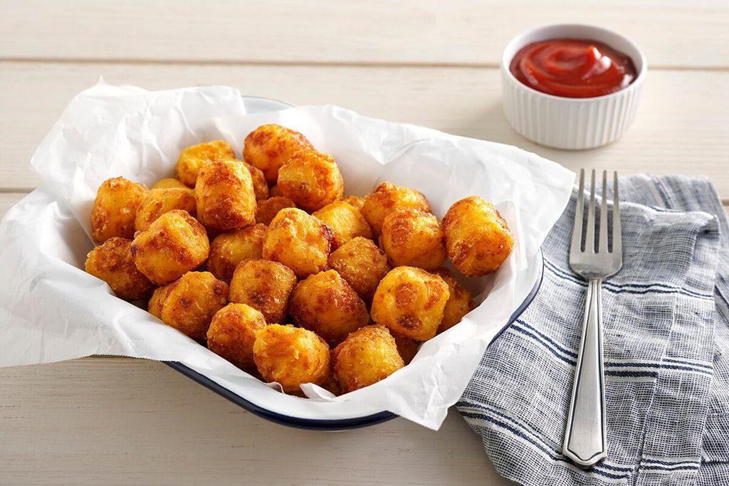Hashbrown Casserole Tots · Serves 5 | Our hashbrown casserole is fried into crispy bite-sized tater tots.


