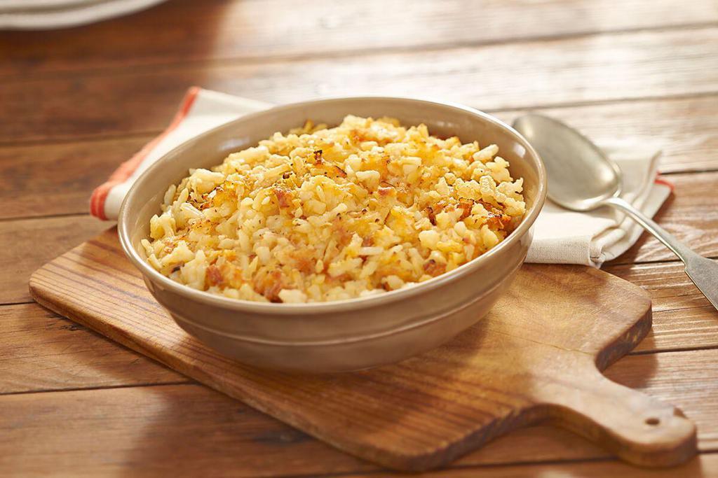 Hashbrown Casserole  · Shredded potatoes, Colby cheese, chopped onions, our signature seasoning blend, salt and pepper baked together in the oven for our Signature Hashbrown Casserole. Packed hot and ready to serve.

