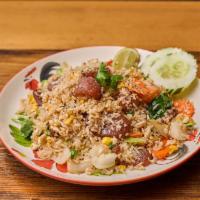 Khao Phad Kun Chiang · Chinese sausage fried rice with Chinese broccoli, tomato, cilantro, onion and egg.