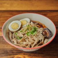 Gauy Tiew Gai · Chicken noodle soup with angel hair noodles, egg, cabbage, cilantro, bean sprouts and shiita...