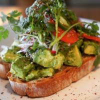 Avocado Toast · Grilled french baguette with avocado chunks, radishes, green onion, cilantro, topped with to...