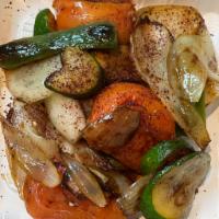 Skewer of Grilled Veggies · Onion, potato, bell peppers, jalapeños. Yellow squash , 