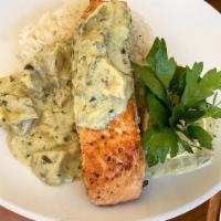 Salmon · Salmon over a garlic, butter creamed spinach and artichoke sauce with basmati rice