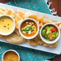 Abuelo's Dip Sampler · A medley of our savory specialties, featuring our chile con queso, queso diablo, guacamole a...