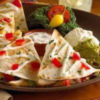 Green Chile Quesadilla · Handmade grilled flour tortillas filled with our Abuelo's signature cheese mix, Anaheim chil...